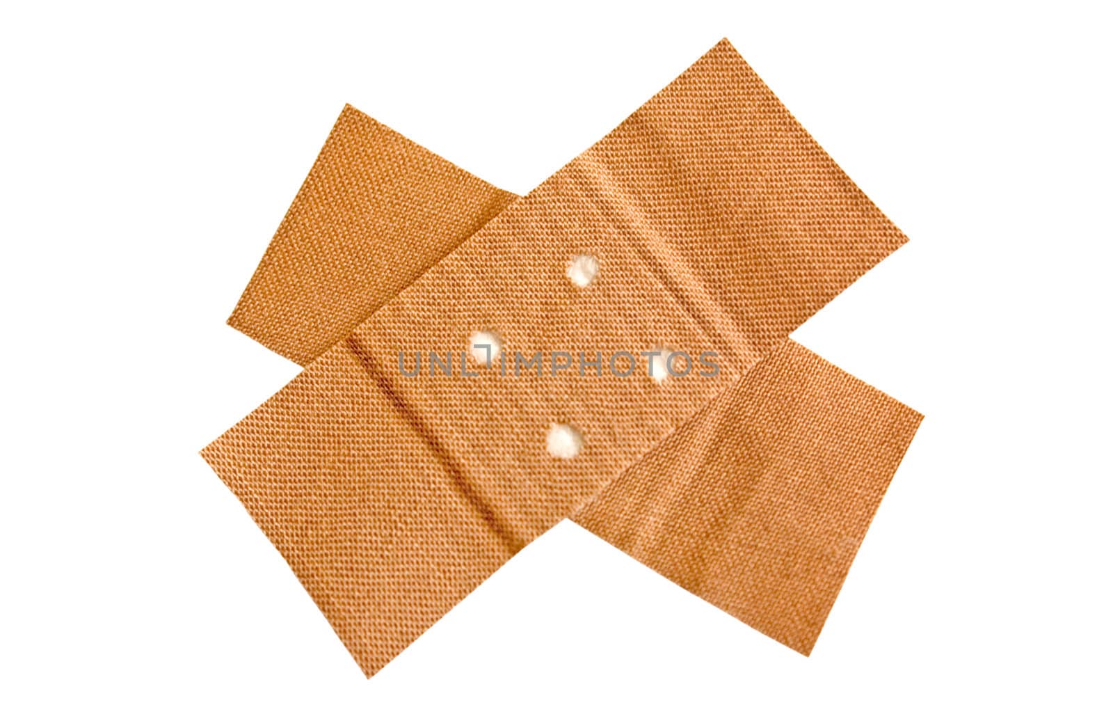 Cross shaped adhesive bandage isolated on a white background. File contains clipping path.