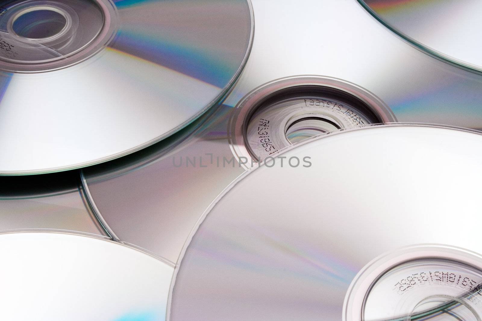 Heap of metallic CDs.