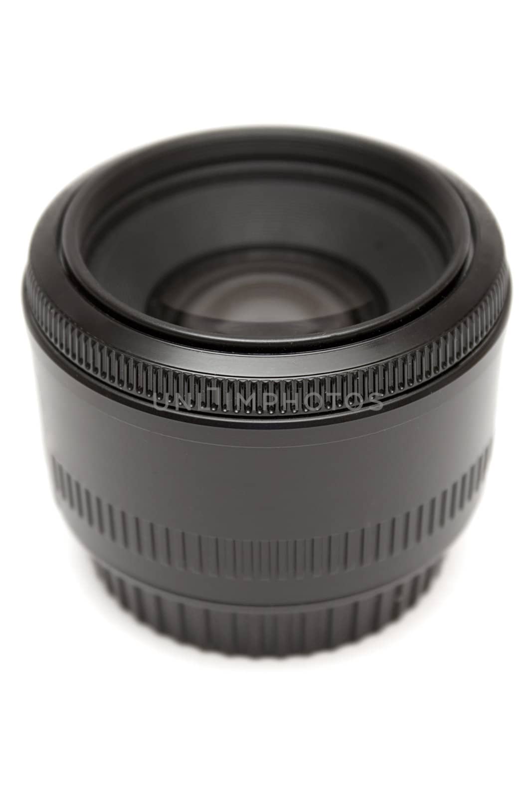 Black prime lens isolated on a white background.