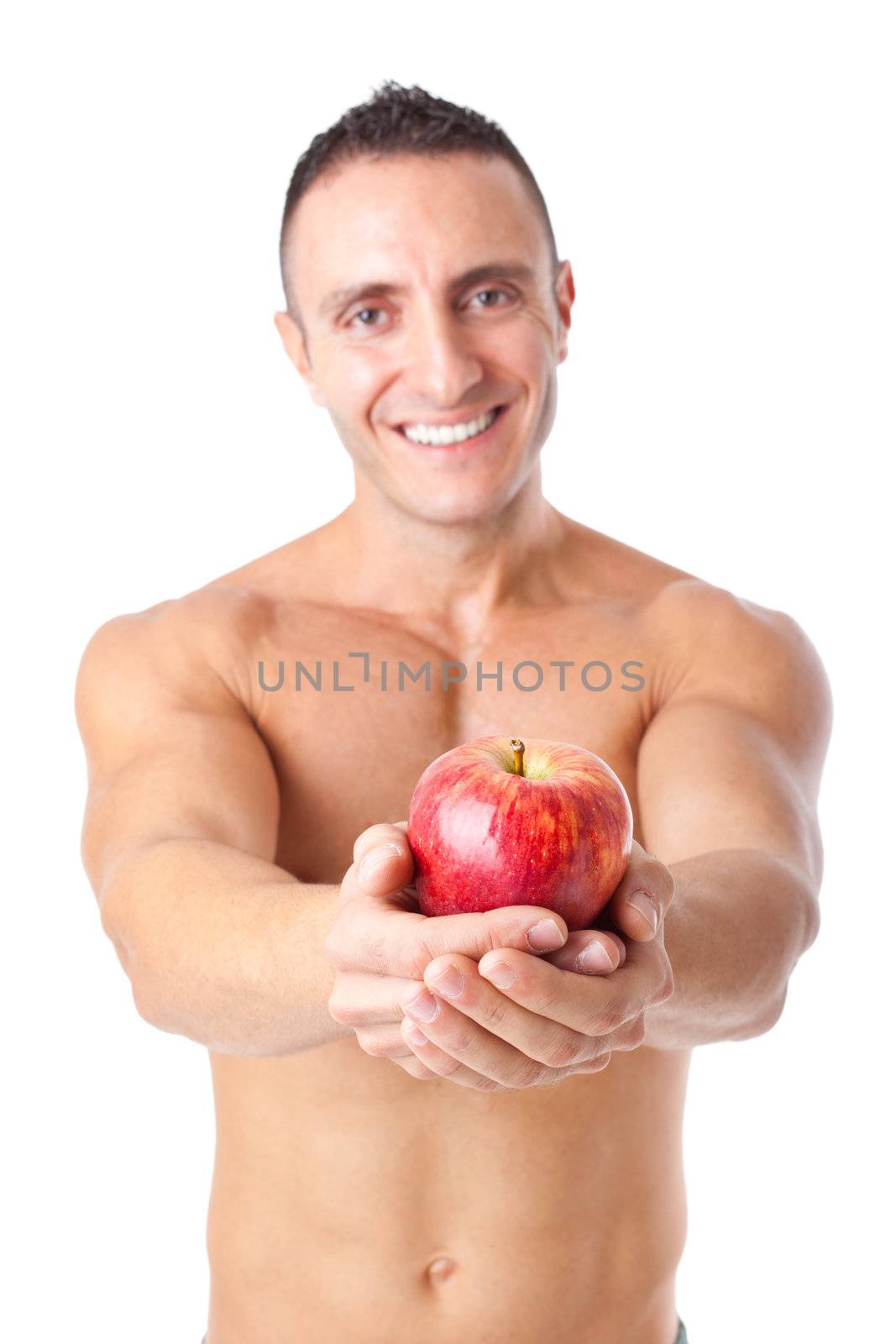 a bodybuilder holding an apple