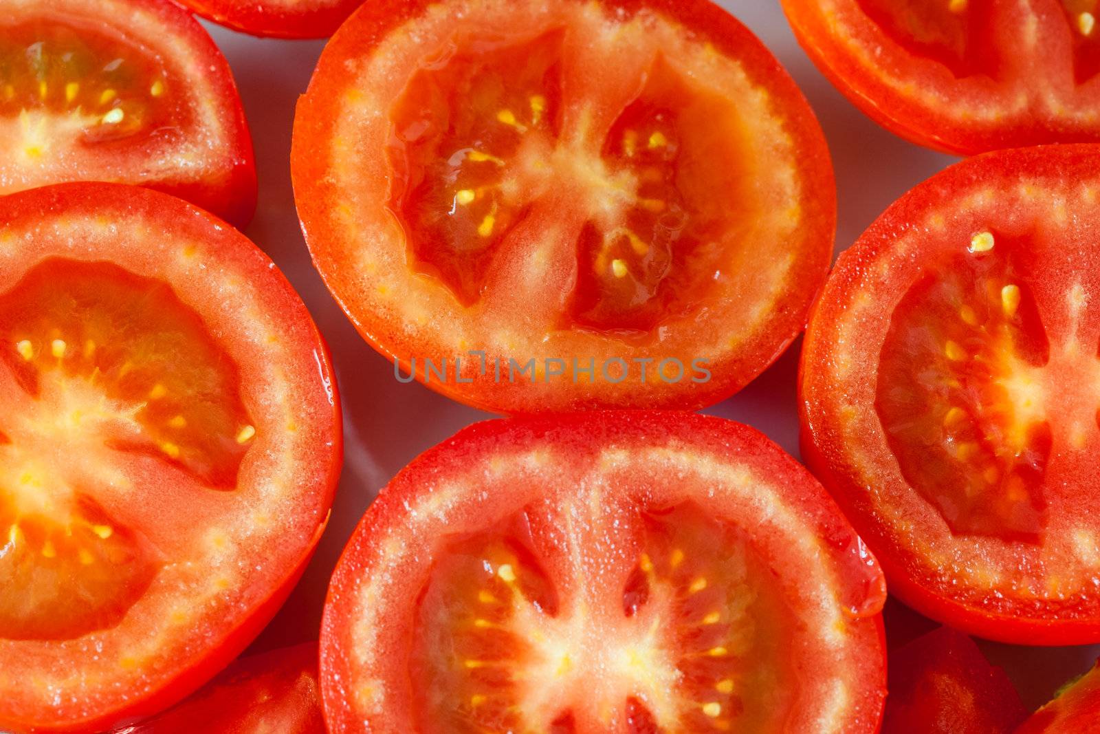 a lot of juicy sliced tomatoes (macro shot)