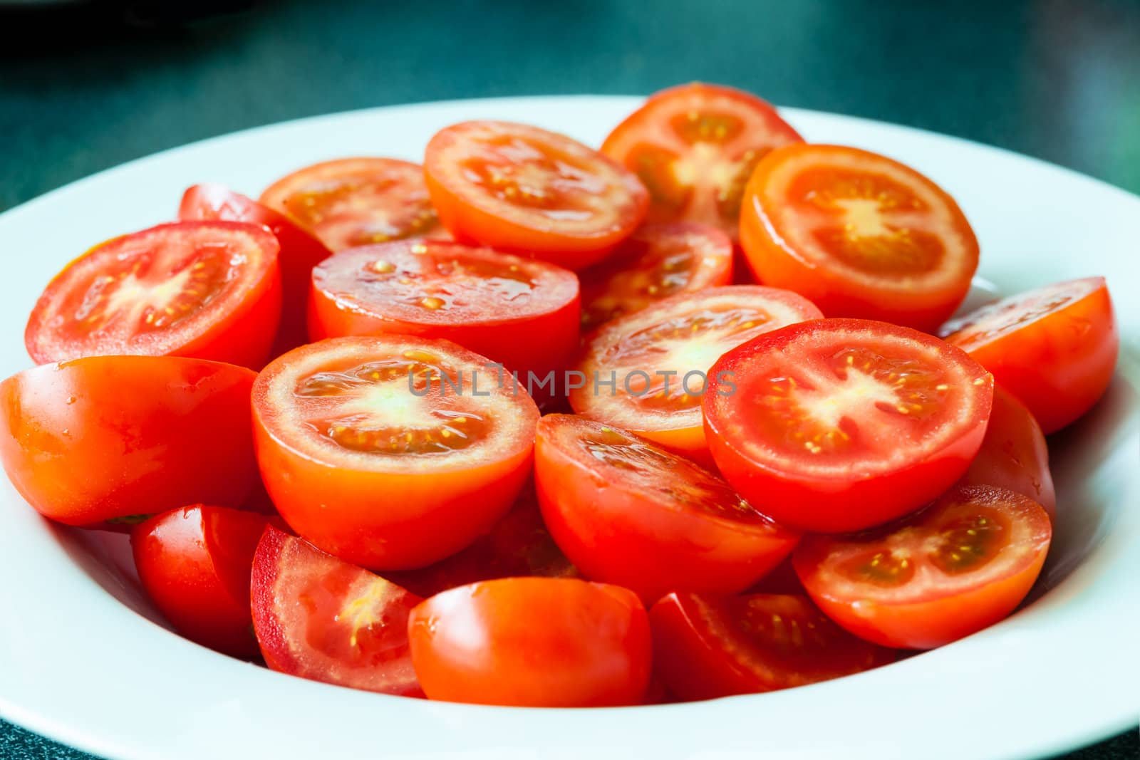 a lot of juicy sliced tomatoes (macro shot)