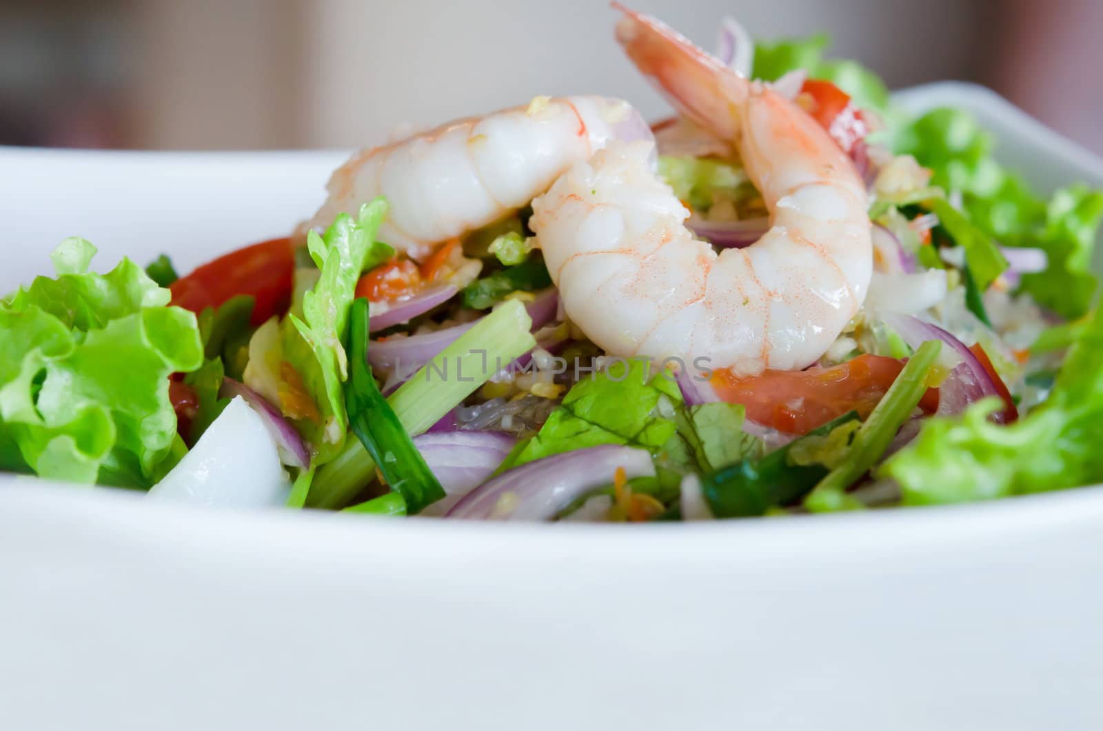 mixed  vegetable and  shrimp in white  bowl .