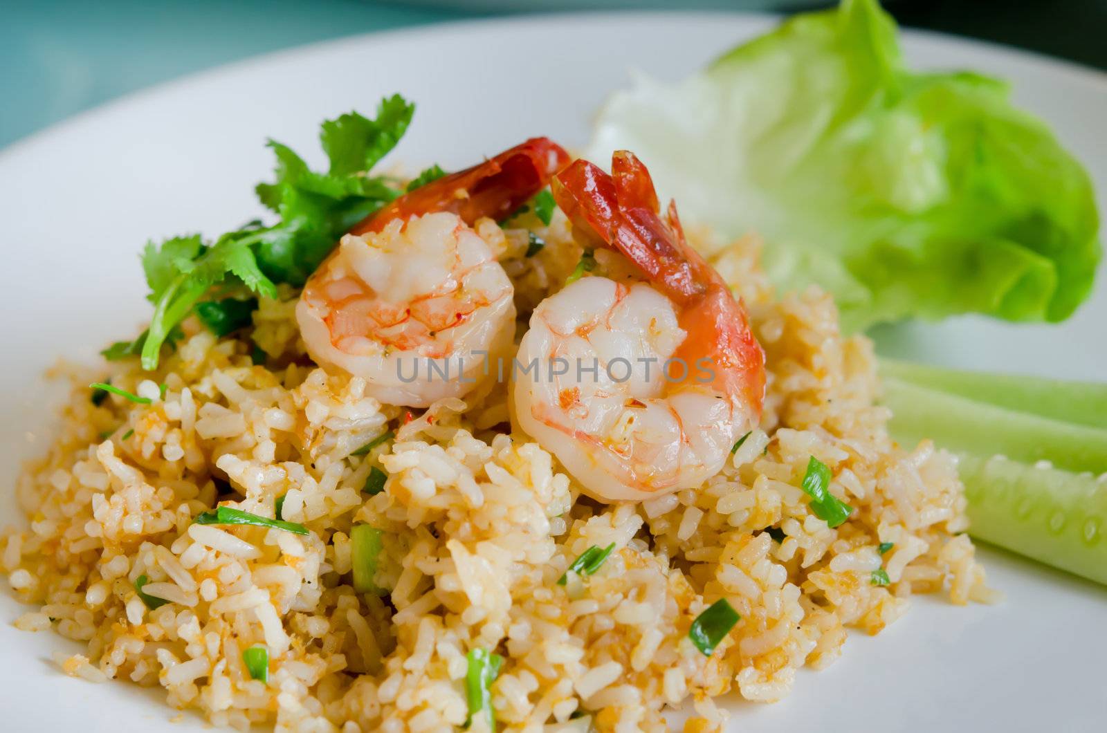 fried rice and shrimp , seafood dish 