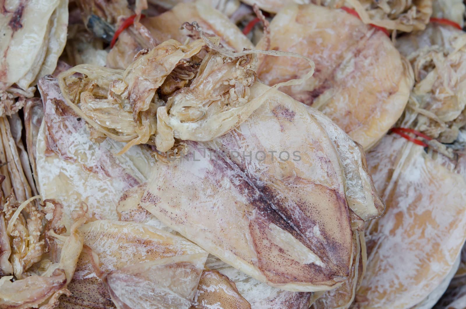 dry squid for sale in market of Thailand