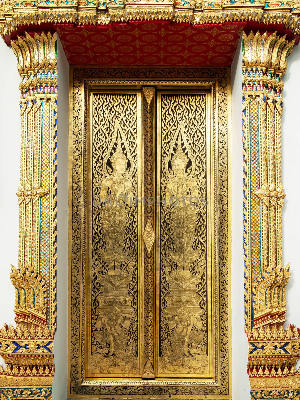 Thai art gold painting on church wood door Bangkok Thailand