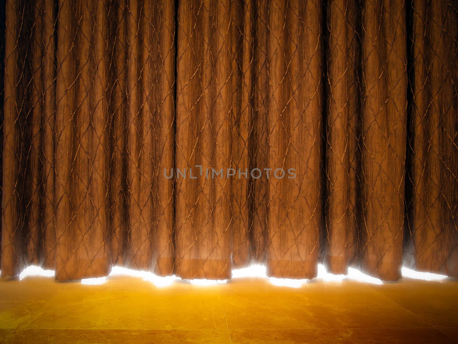 Gold curtains with light from a stage