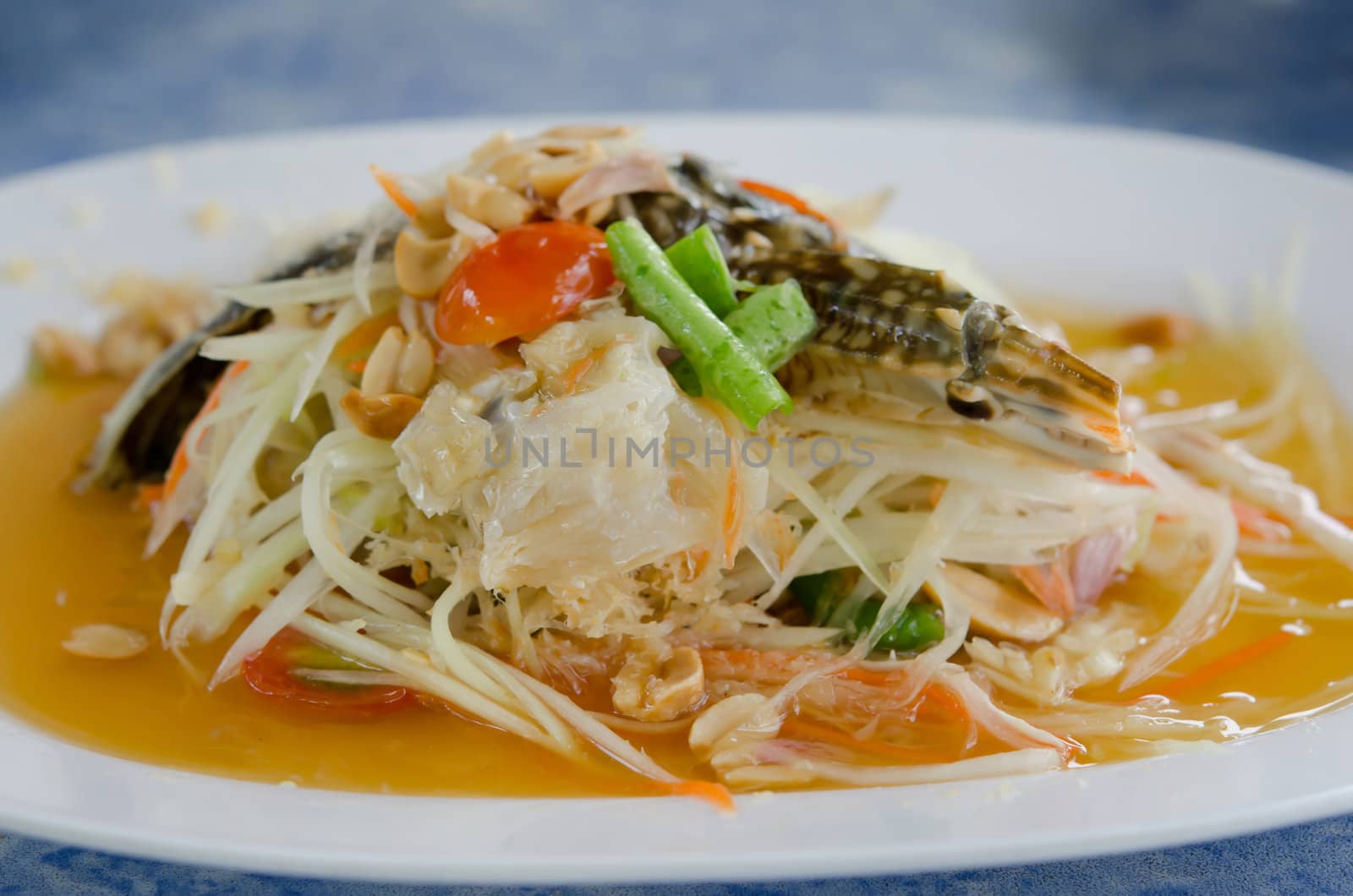 close up  papaya spicy salad with crabs