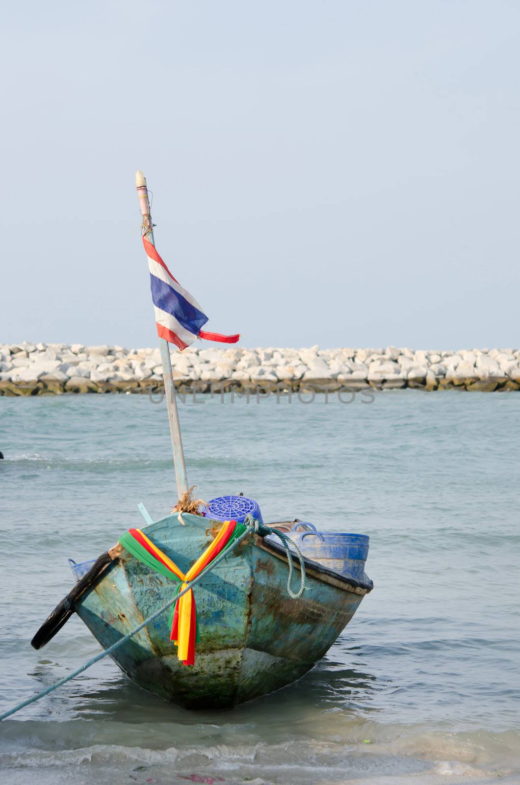 single Thai boat in the bay