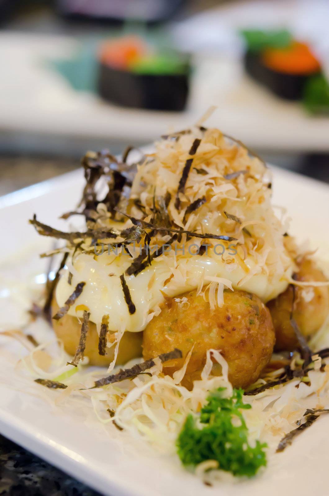 Takoyaki octopus balls - Japanese food .