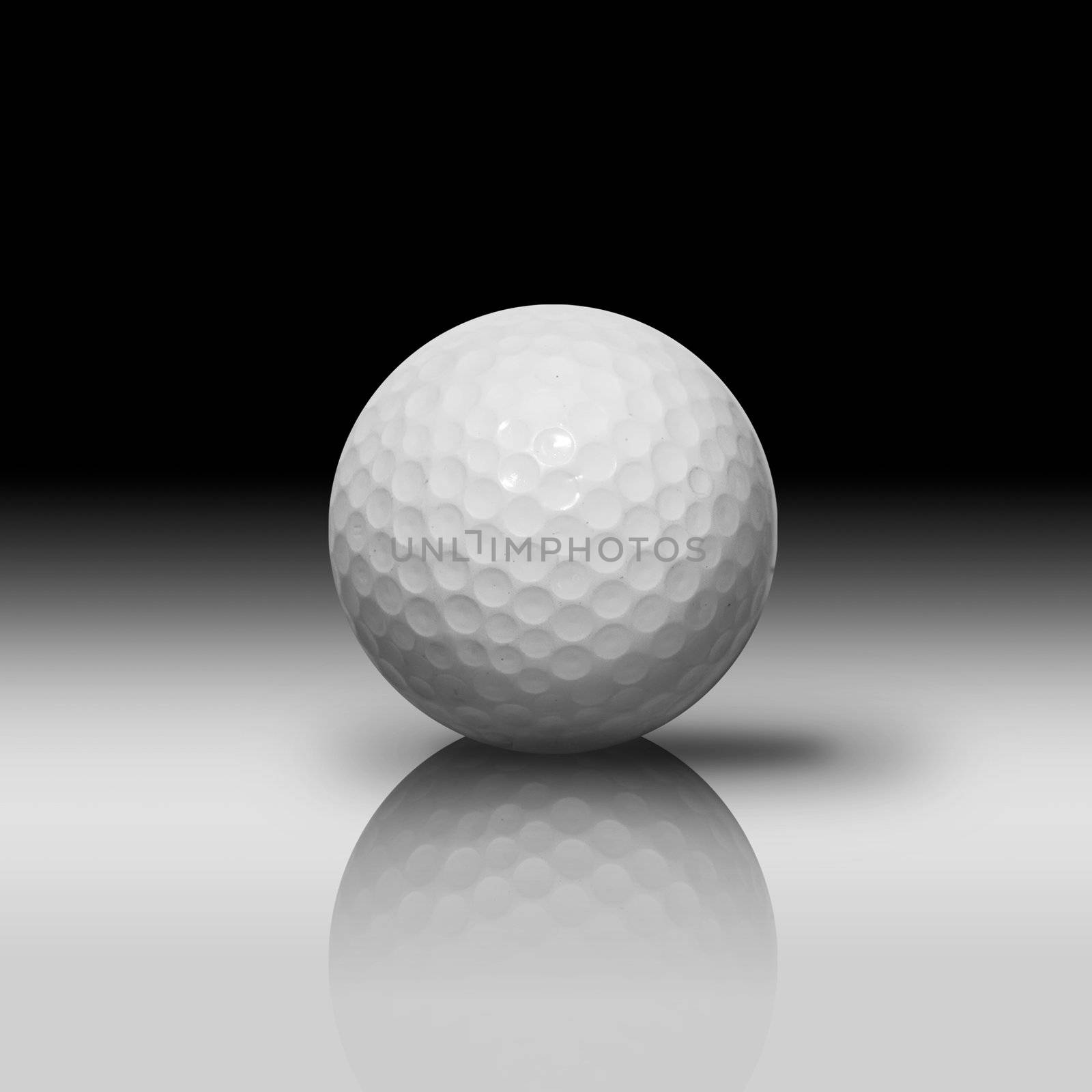 White Golf Ball on White Reflect Floor and Black Background