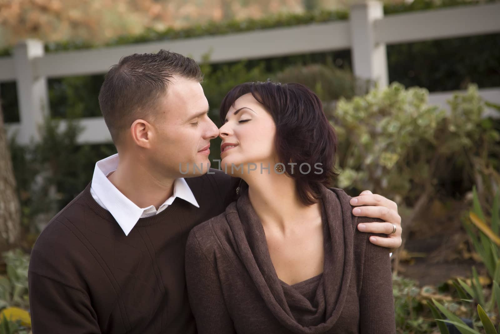 Attractive Couple Portrait in Park by Feverpitched