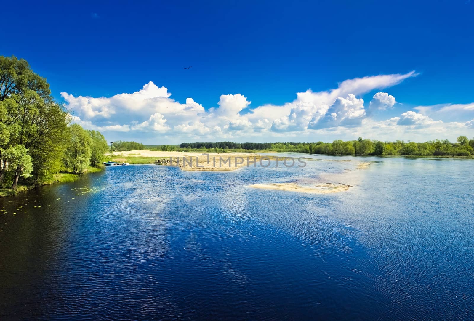 Island on blue cold lake by ryhor