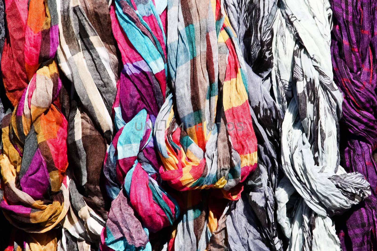 A set of scarves on a flea market with strong colors