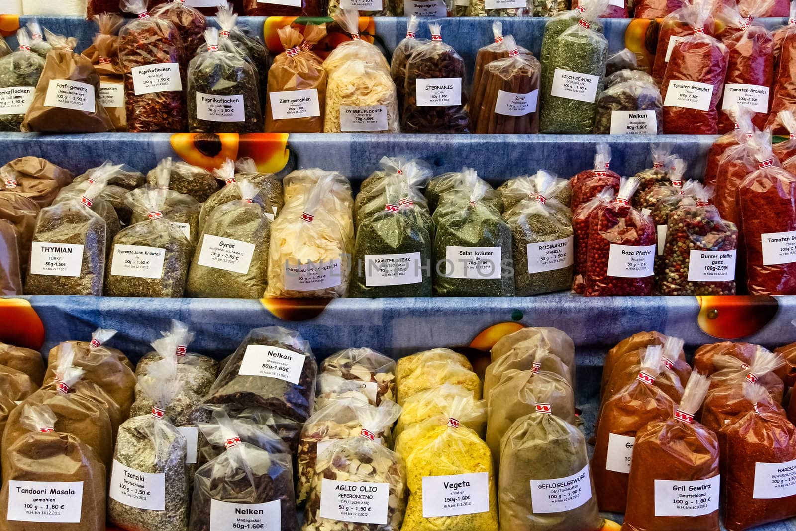 Herbs and spices on a market by kyrien