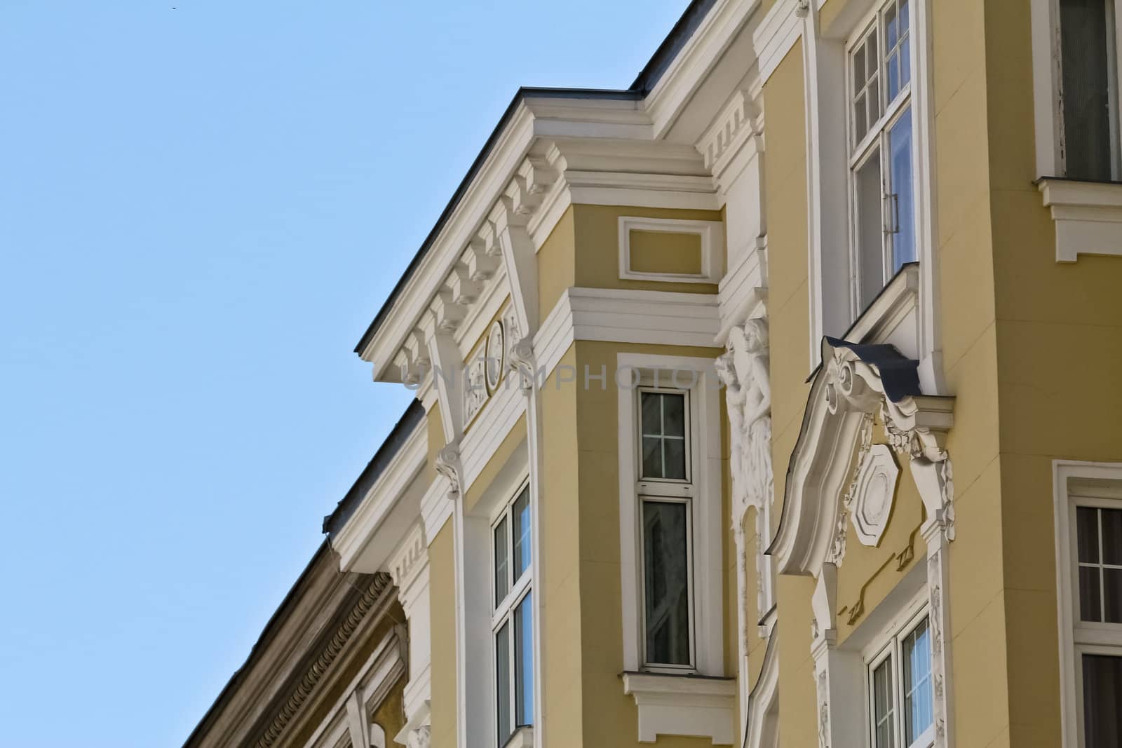 A beautiful classic facade from right in Vienna on blue sky