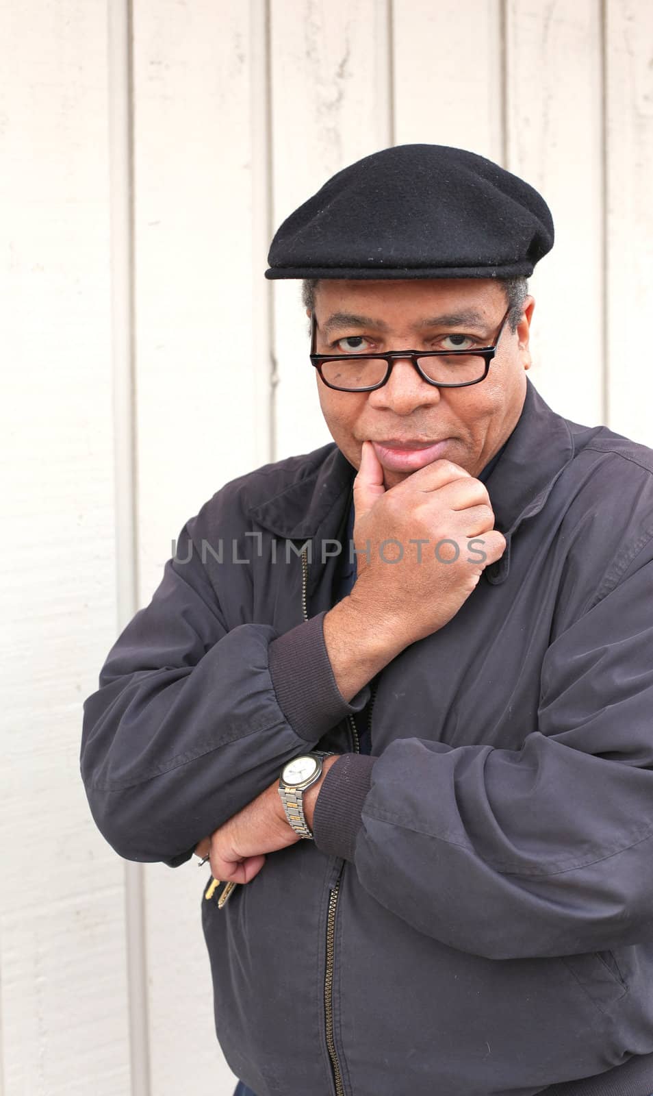 African american male posing outside.