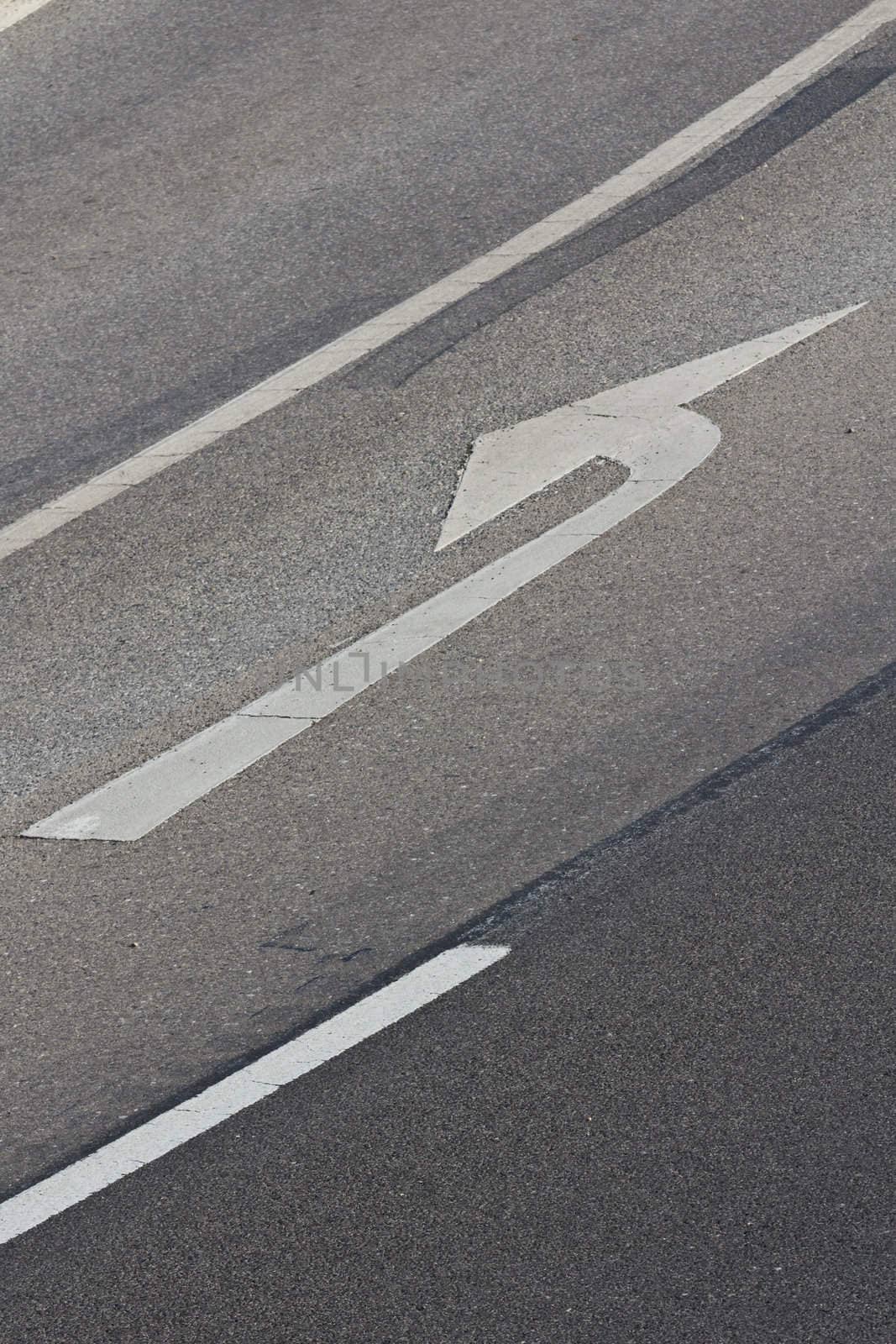 A road sign to turn left on a road lane in the outskirts of Vienna