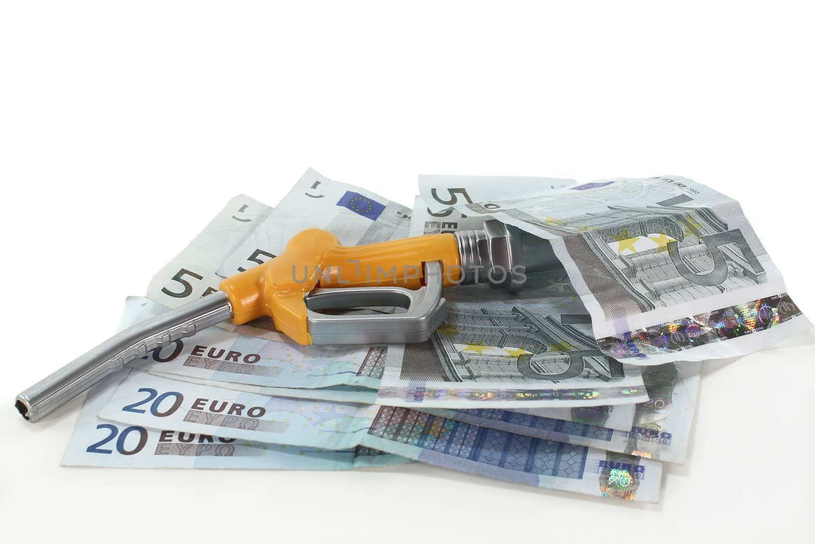 fuel nozzle and euro notes on a white background