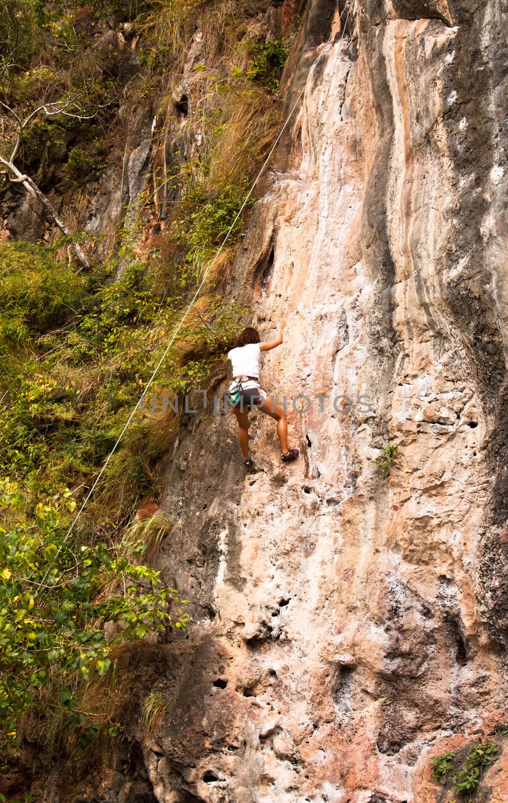 Women are climbing. It is a sport game of croquet.