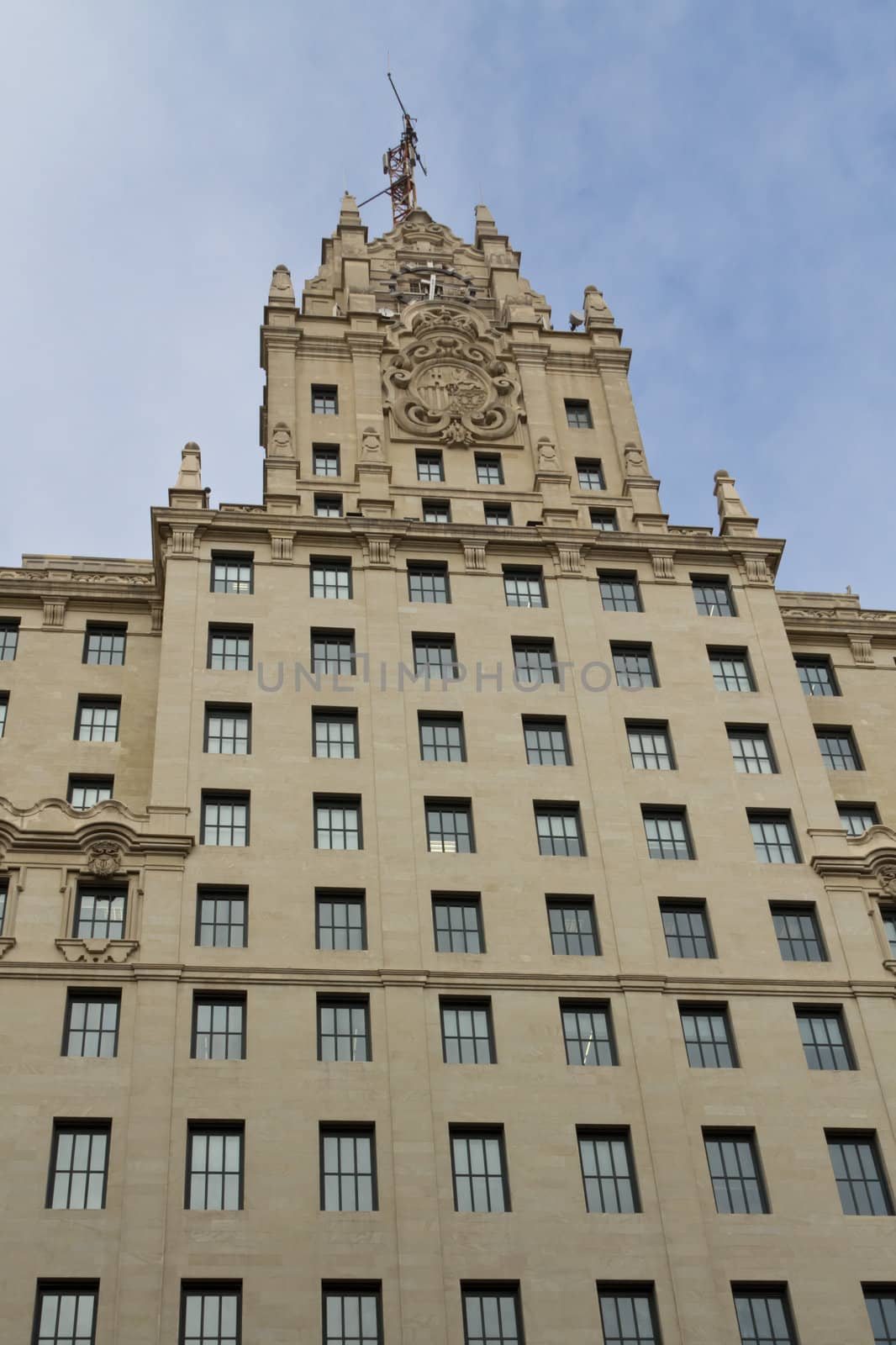 A classical Madrid building housing a telecommunications group.