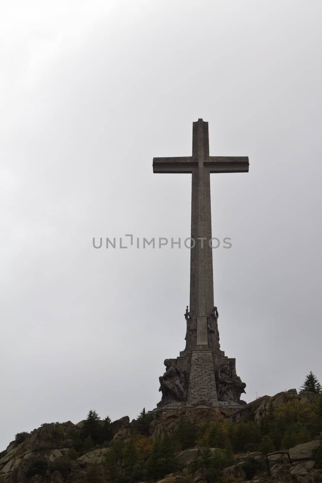A large cross marking the top of the valley of the fallen with General Franco's tomb, close to Madrid, Spain