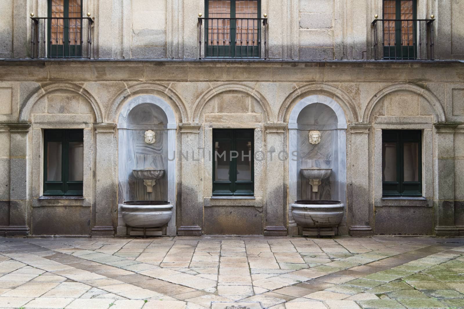 An inner courtyard of the famous renaissance building El Escorial close to Madrid, Spain