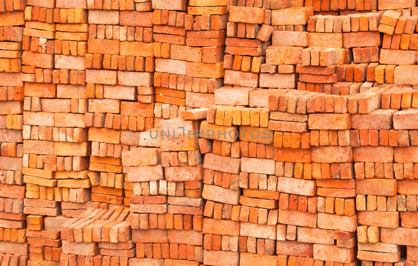 Lots of red brick. The stacked into a wall.