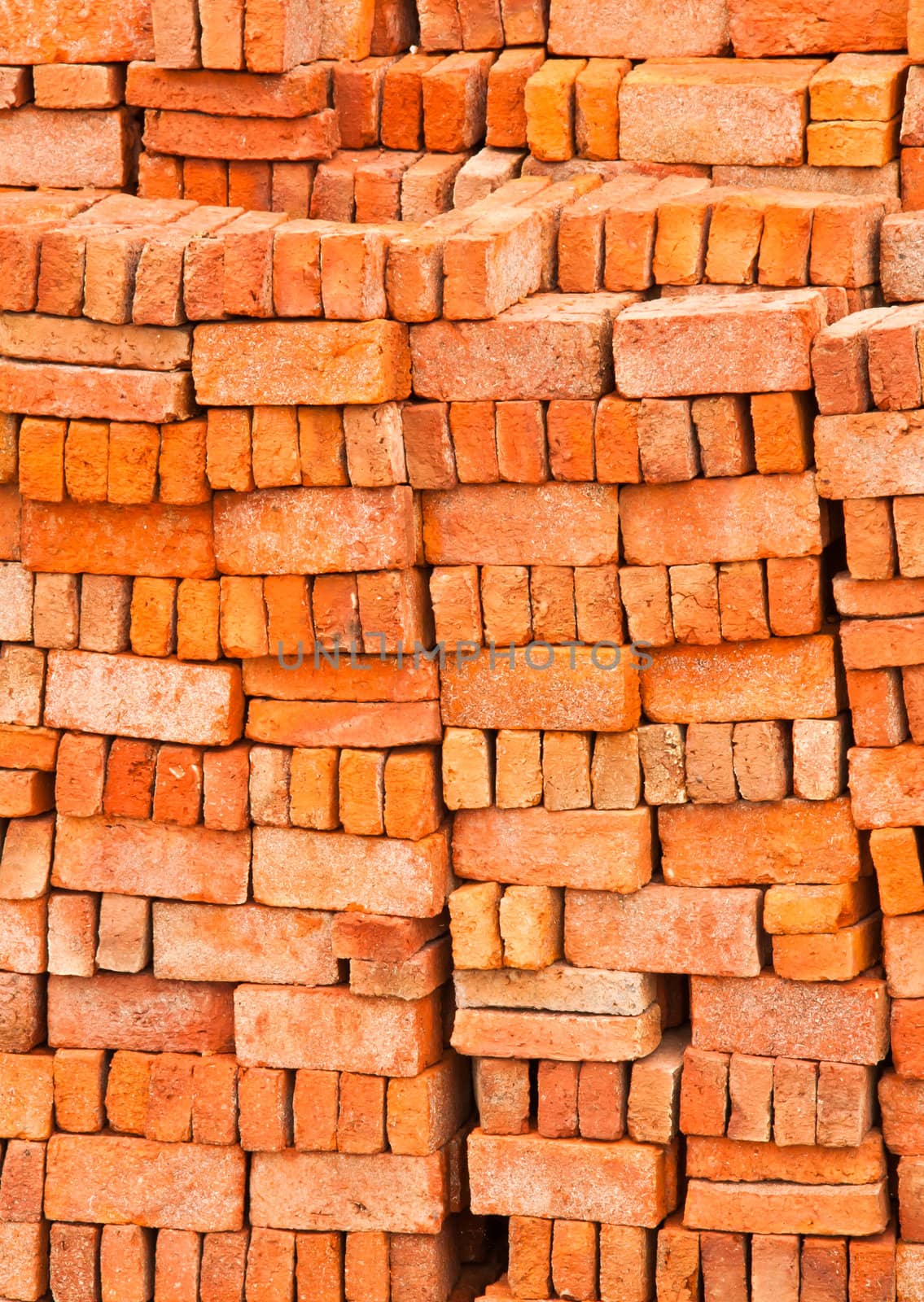 Lots of red brick. The stacked into a wall.