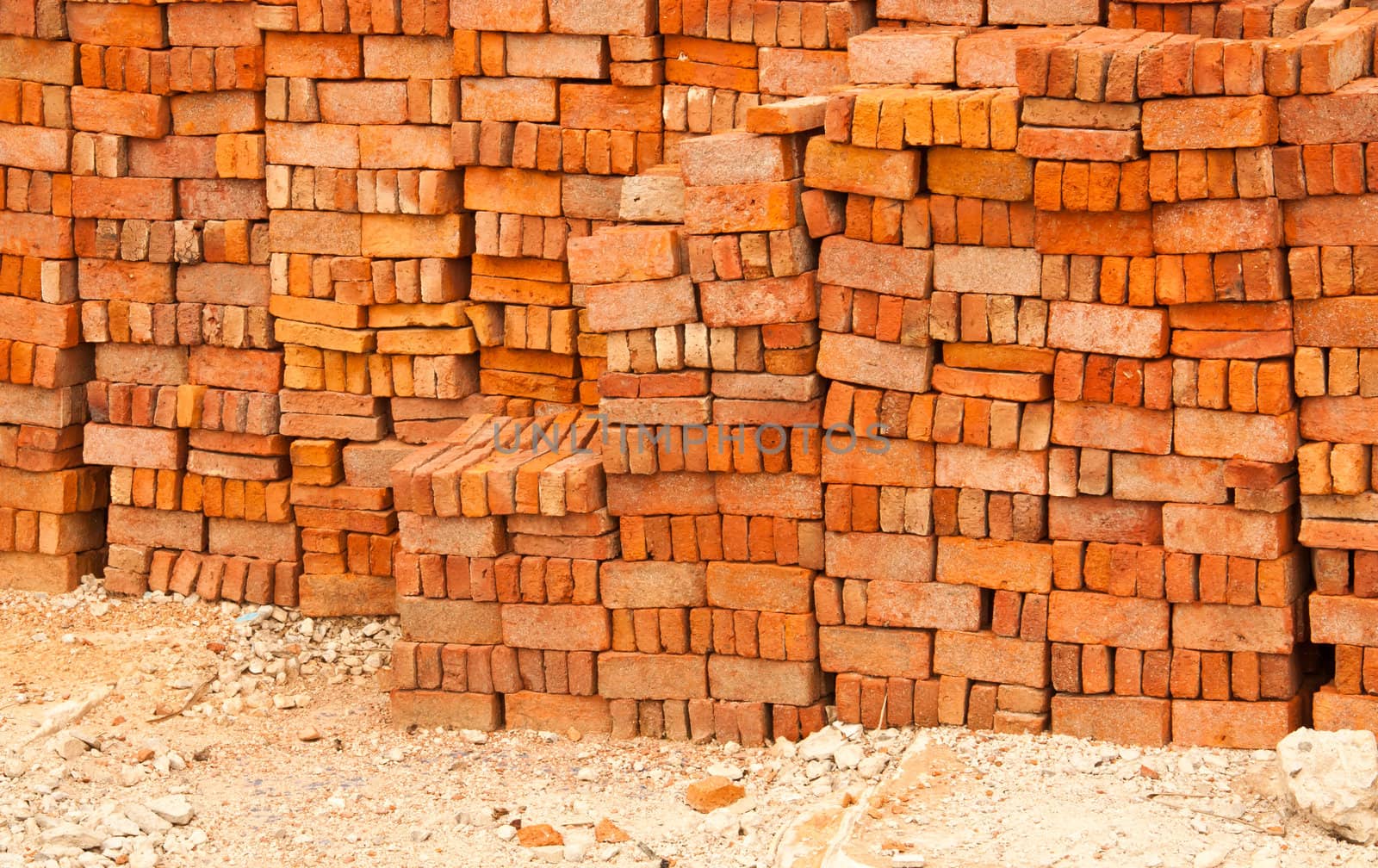 Lots of red brick. The stacked into a wall.