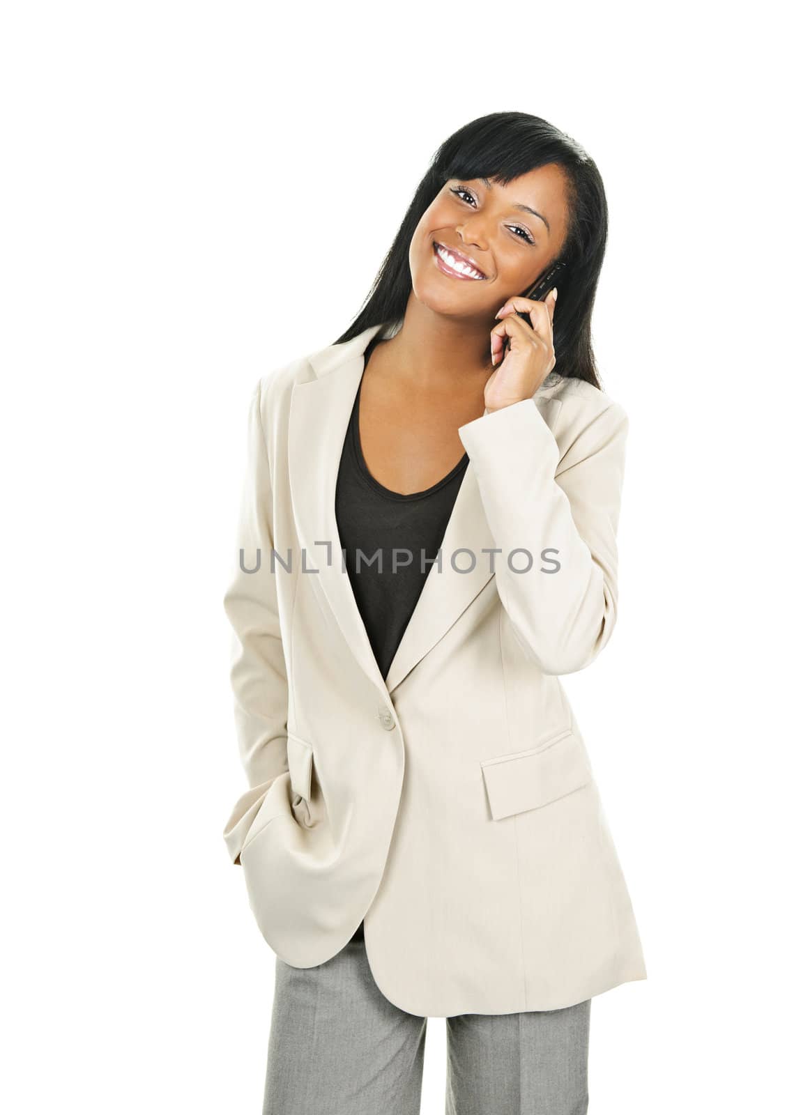 Young smiling black businesswoman on cell phone isolated on white background