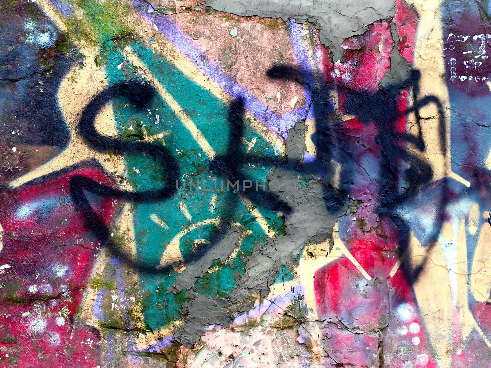 piece of graffiti images on an old brick wall as background