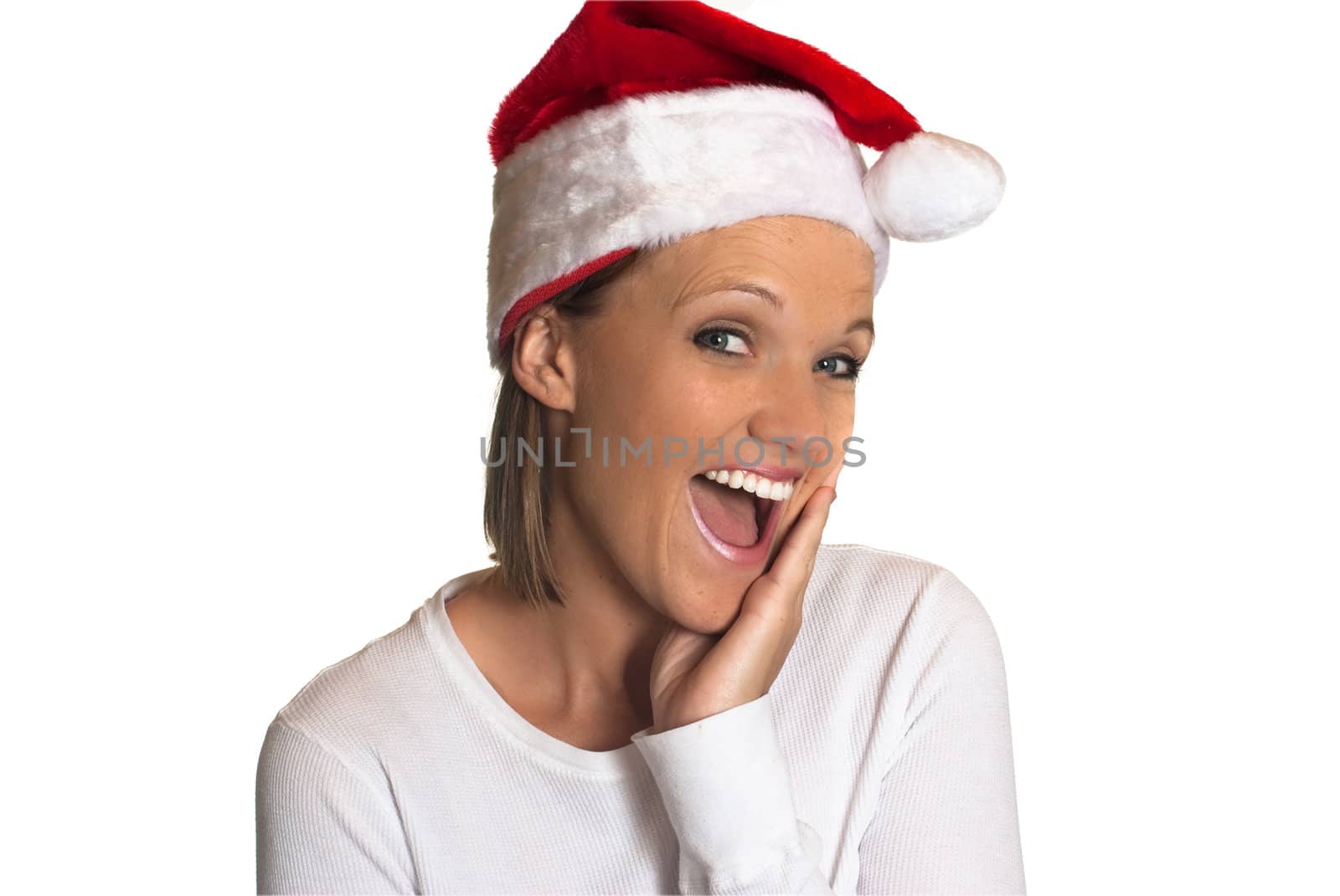 Woman in Santa hat suprised.  Isolated on white background.