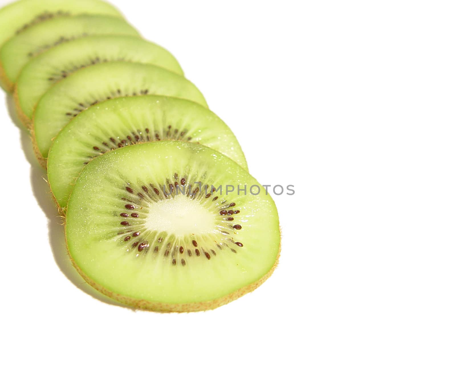 sliced kiwi in white background