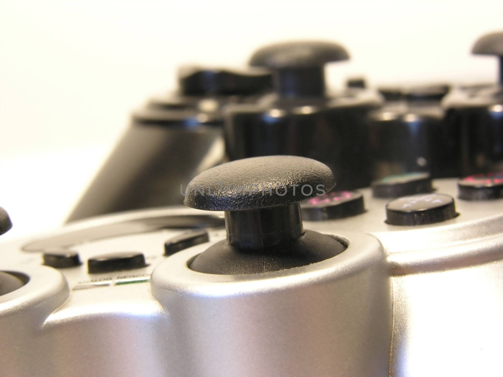 two playstation controller isolated in white