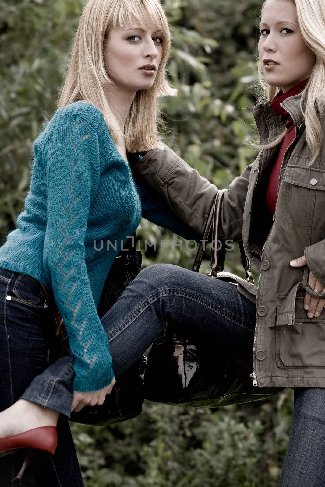 two sisters in a park having fun