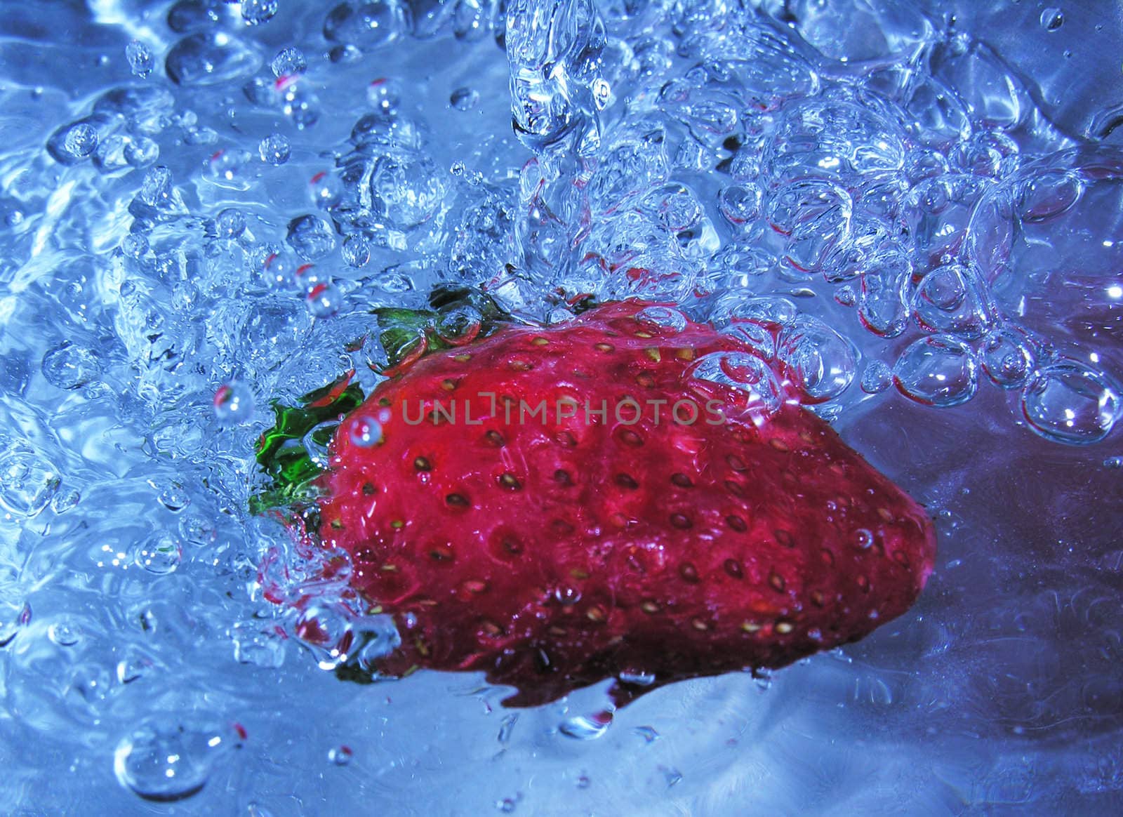 refreshing strawberry in water