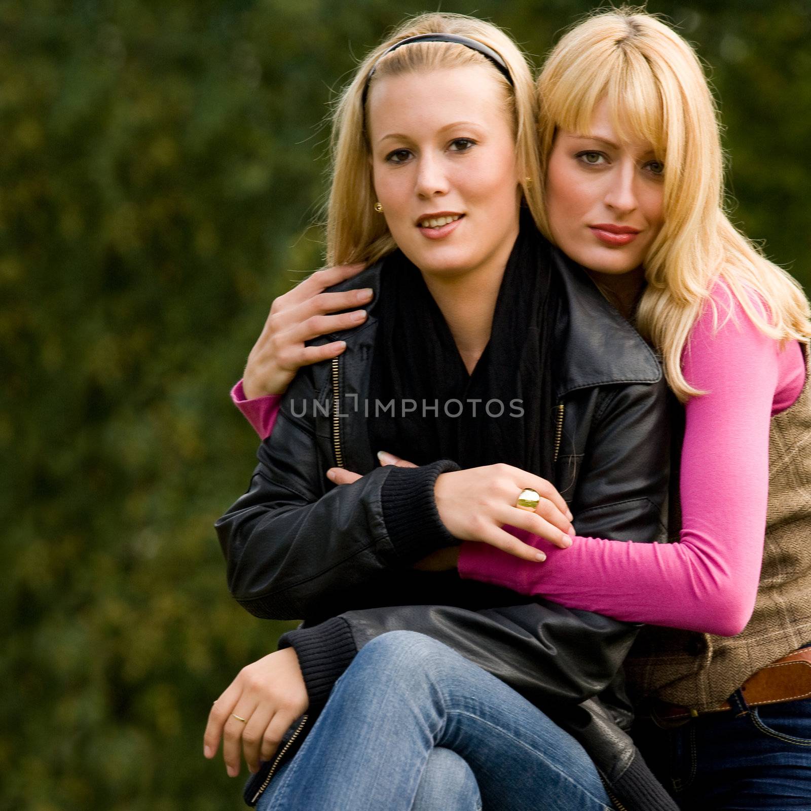 two sisters in a park having fun