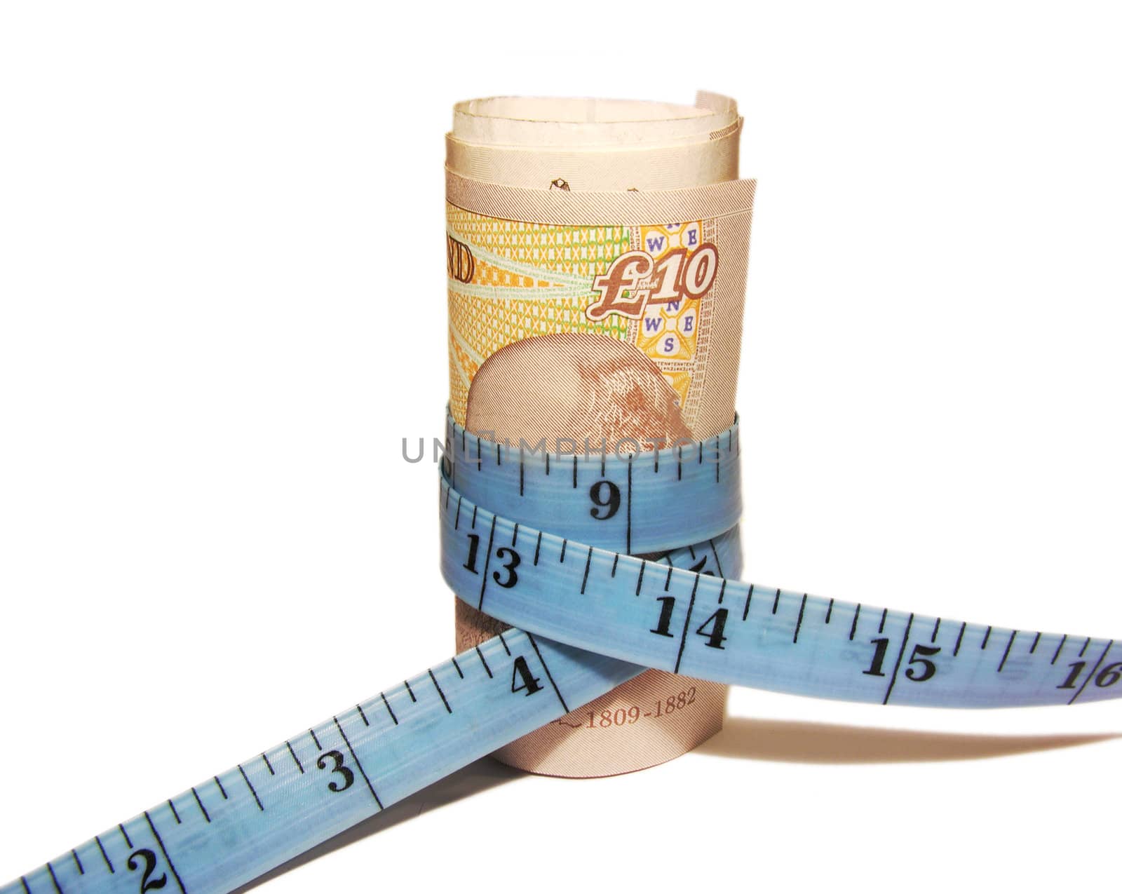 Closeup of a stack of bills encircled by a measuring tape