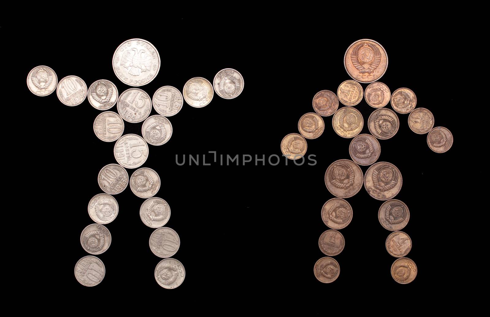 business symbol - man and woman silhouette of coins