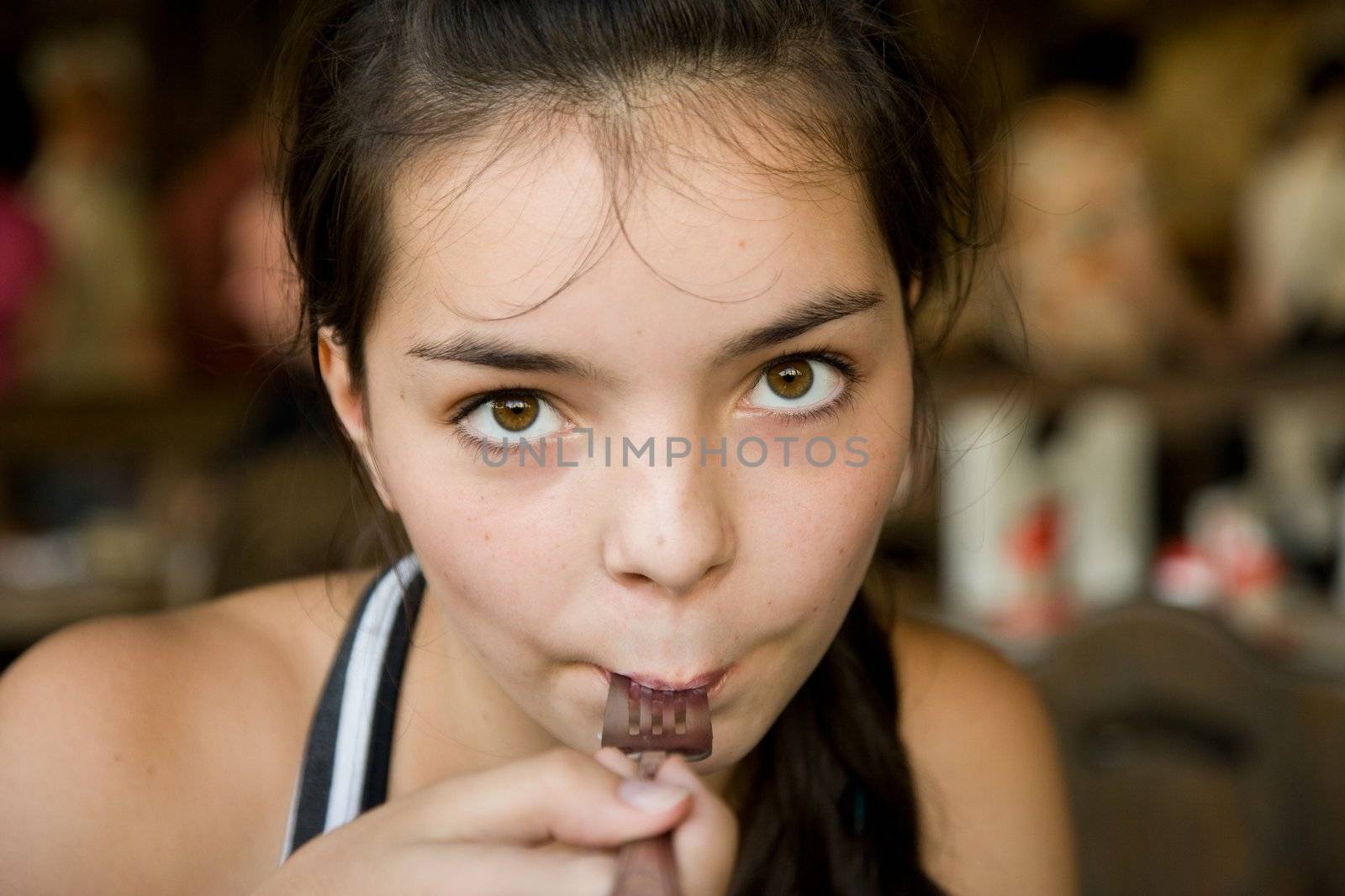 Girl-teenager in cafe by Gravicapa