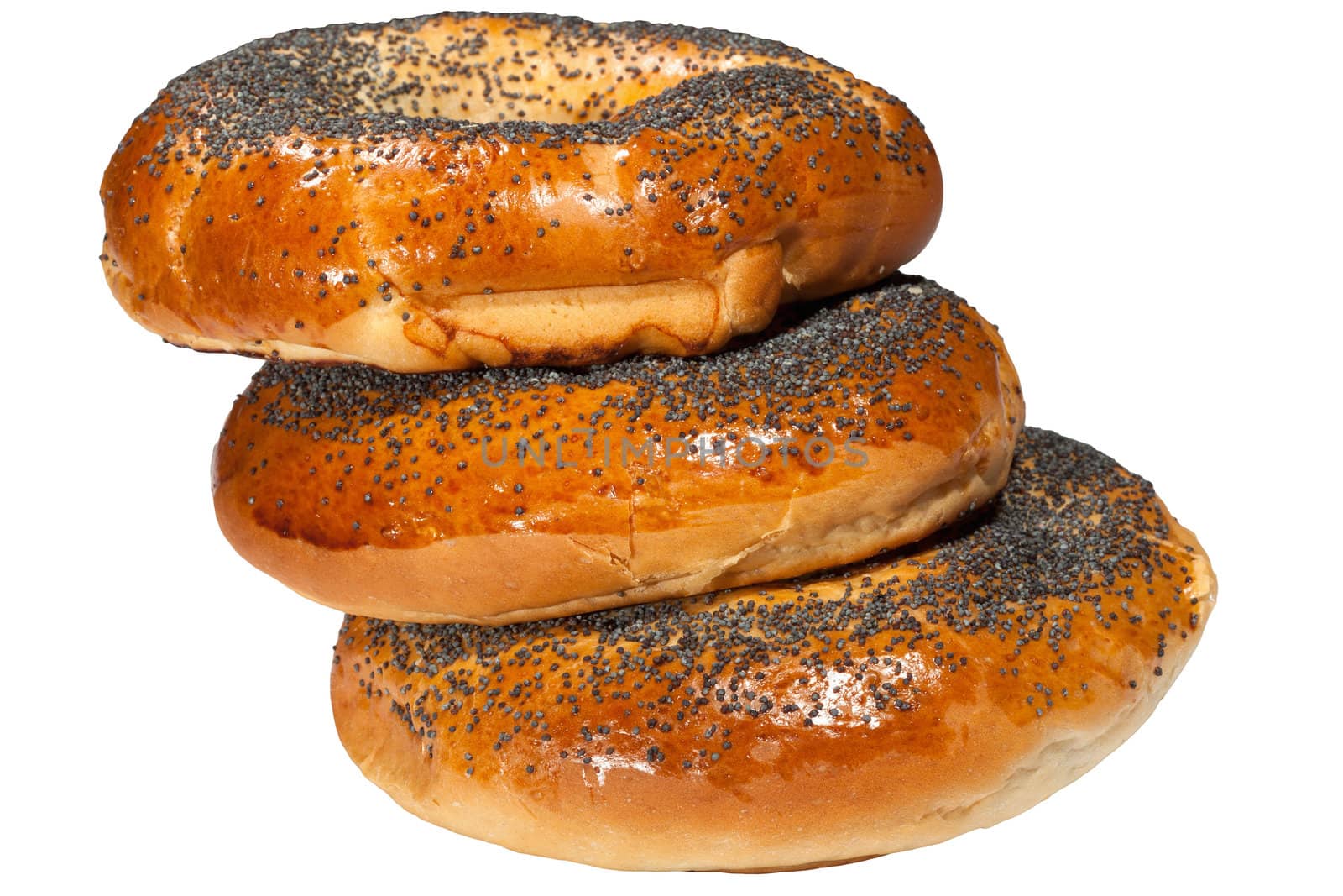 bagels with poppy seeds on white background by sfinks