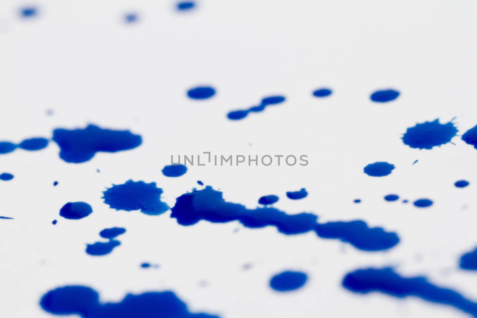 Blue splatter on white background