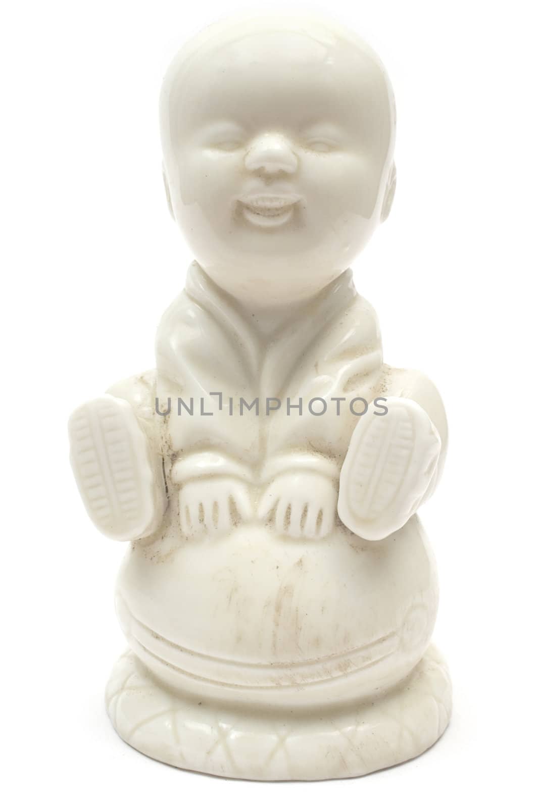 Antique Buddha statue isolated on white.