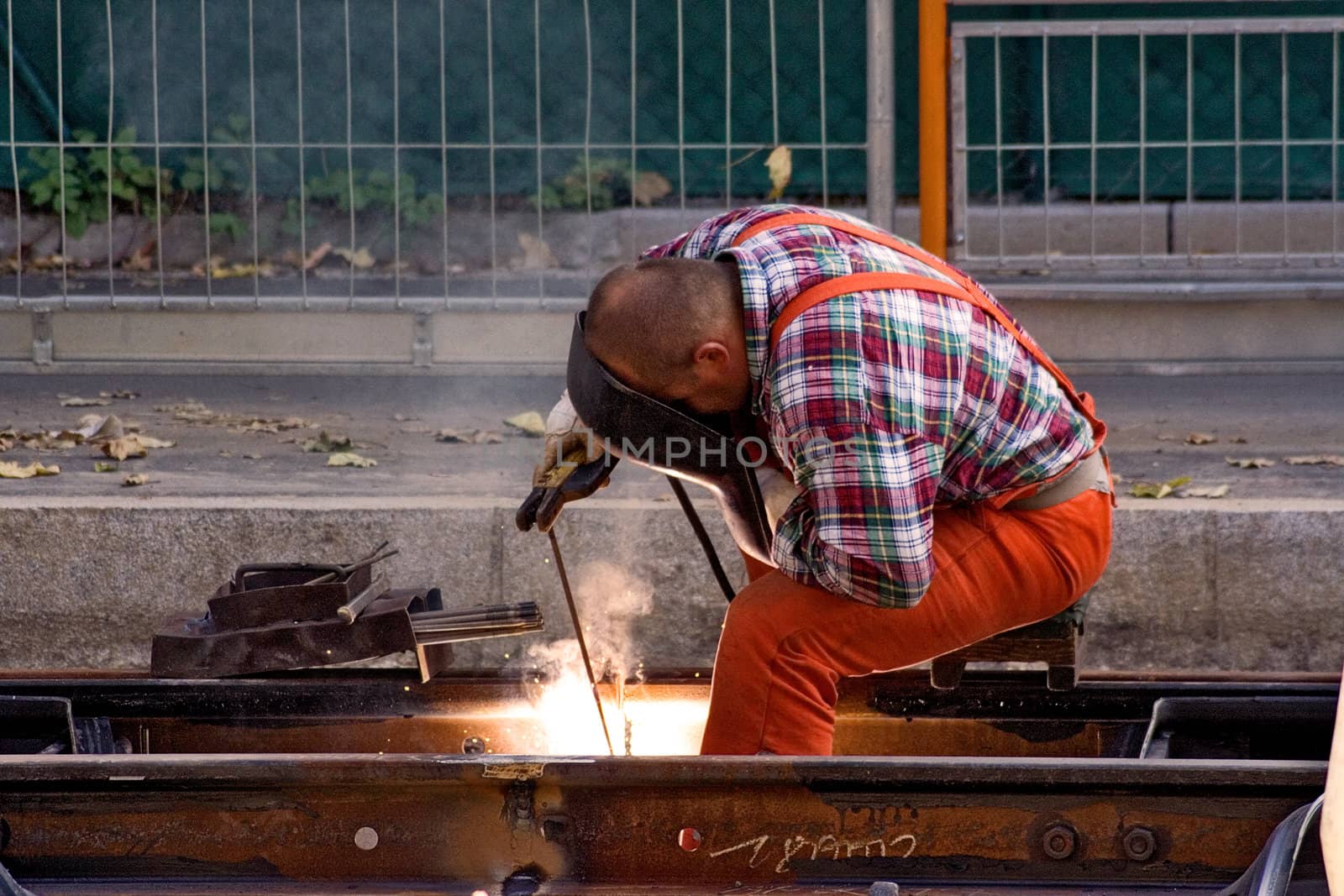 Construction worker repairing rails.