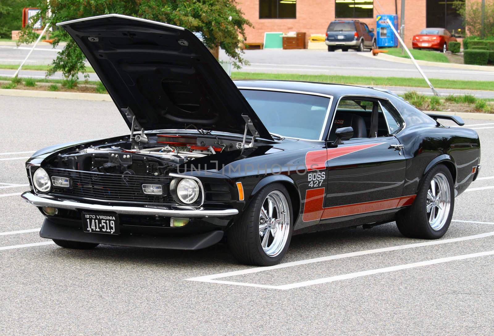 GLOUCESTER, VA, USA -SEPTEMBER 16: Vintage 1970 Ford Boss 427 Mustang in the Middle Peninsula Classic Cruisers Club weekly Car Show. Main Street Center. September 16, 2011 in Gloucester, VA, USA
