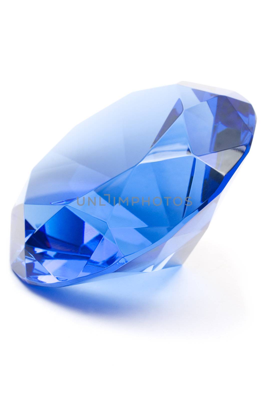 Shiny sapphire isolated on white.