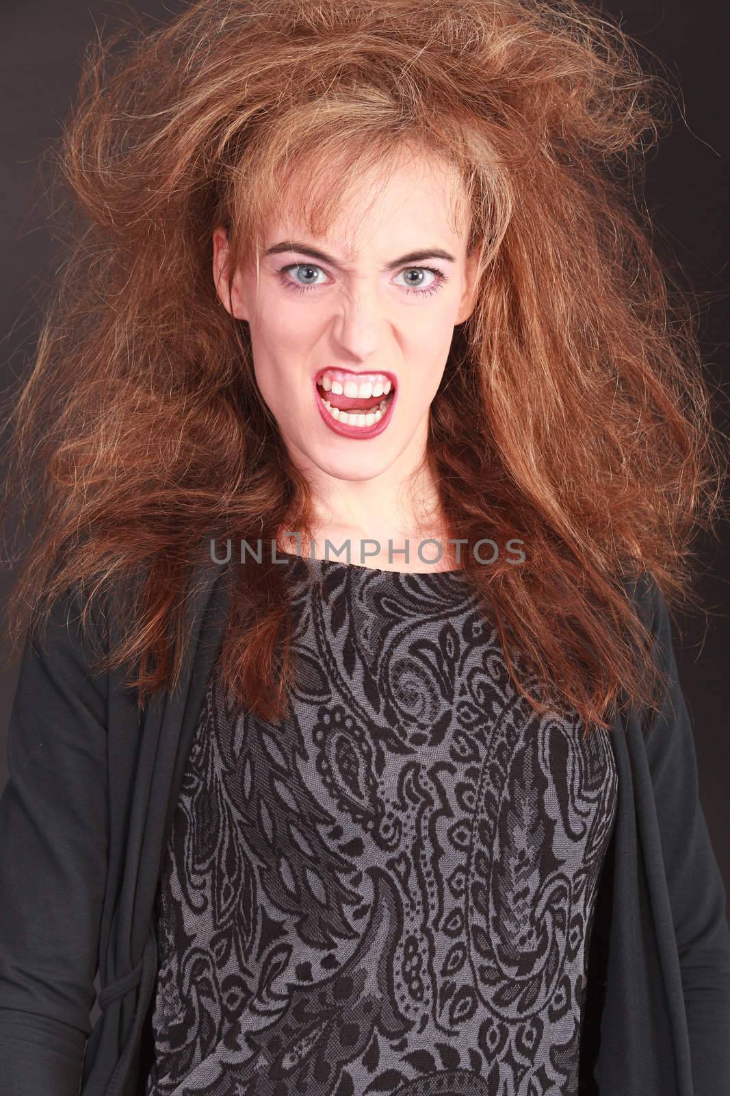 Angry woman with stylish hairstyle