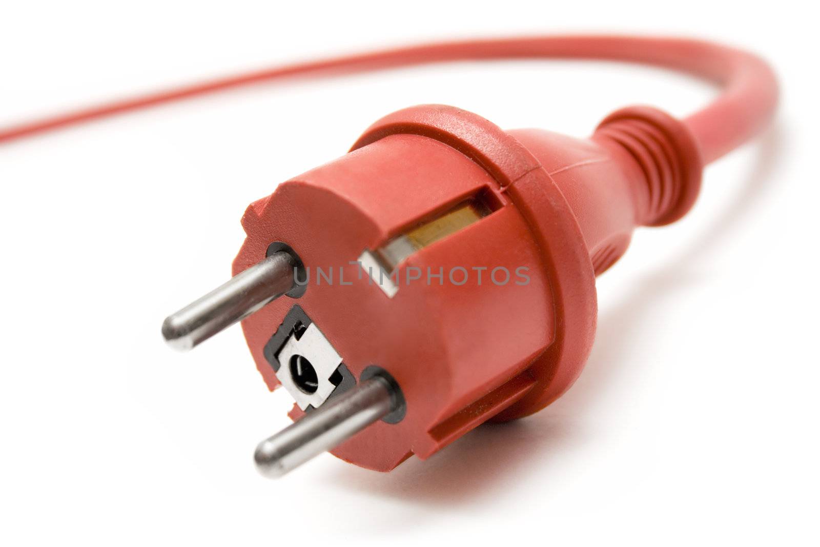 Red plug with extension cable in the background.