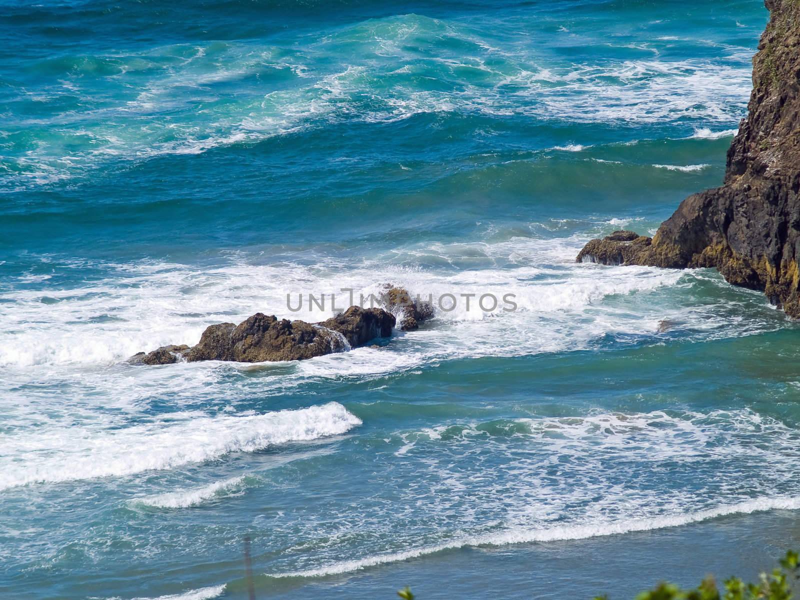 Boulder on the Shore with Waves Crashing